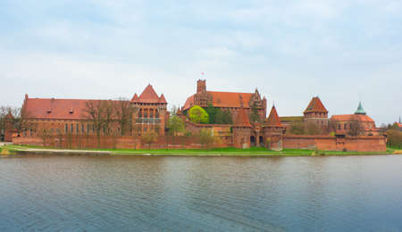 Teutonic castle Malbork in Pomerania region of Poland over Nogat river  UNESCO World Heritage Site ...