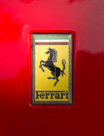 PUERTO DE LA CRUZ - JULY 14: The Cavallino Rampante, symbol of Ferrari on red luxury car at opening...