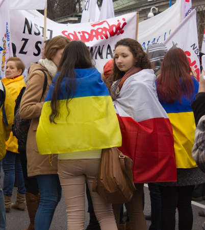 WARSAW - MARCH 8: Protesters rally near russian embassy against invasion to Crimea, Ukraine during an event organized by Solidarity trade union in Warsaw, Poland on March 8, 2014のeditorial素材