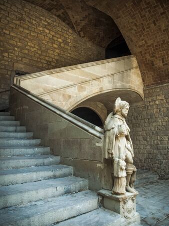 The stair with the sculpture in the inner yard. Barcelona, Spainの写真素材