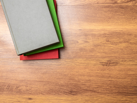 Top view on the pile of books lying on the tableの写真素材