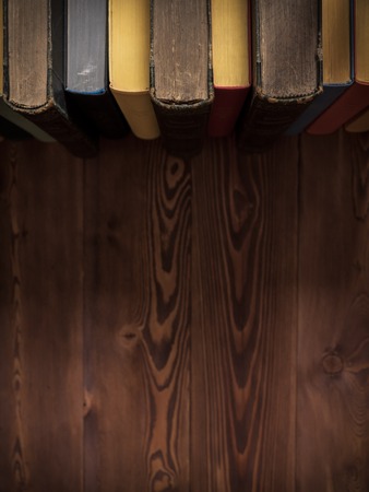 Several books standing on the table. Top view. Selective focusの写真素材