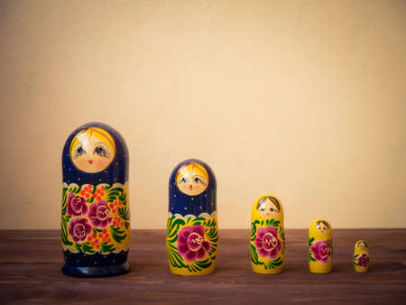 Russian matrioshka on the wooden table. Front viewの写真素材