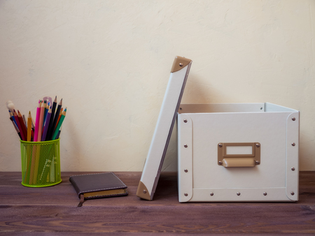 Side view of workplace in the office on the wooden tableの写真素材