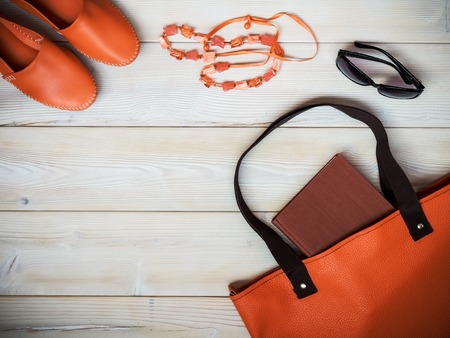 Beach accessories on wooden background. Holidays concept. View from aboveの写真素材