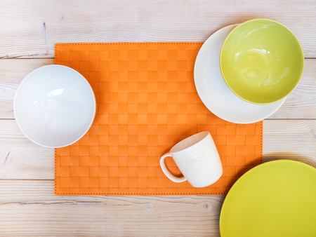 Collection of plates and bowls on the table. View from aboveの写真素材