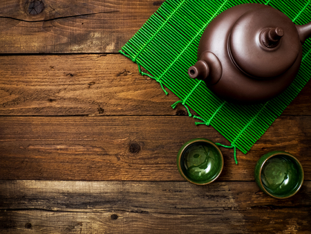 Green japanese tea on wooden table. Top view with copy spaceの写真素材