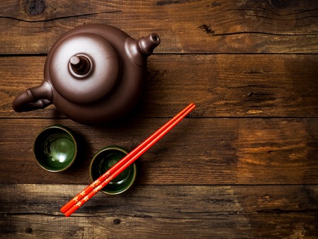 Green chinese tea on wooden table. Top view with copy spaceの写真素材