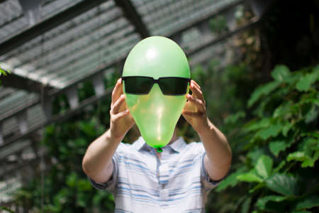 Globe with sunglassesの写真素材