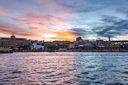 Sydney Harbour with picturesque sunset sky on the backgroundの写真素材
