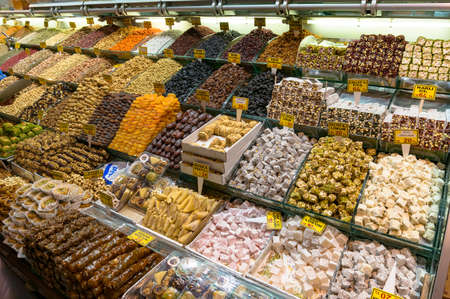 Istanbul, Turkey - August 27, 2013: Authentic Turkish sweets, turkish delight and dryed fruits on display on Grand Bazaarの写真素材