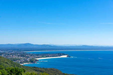 Aerial view of Australian coastline landscape panorama with view of One Mile beach and Tuncury beach . View from Cape Hawke lookout in Booti Booti National park. NSW, Australia.の写真素材