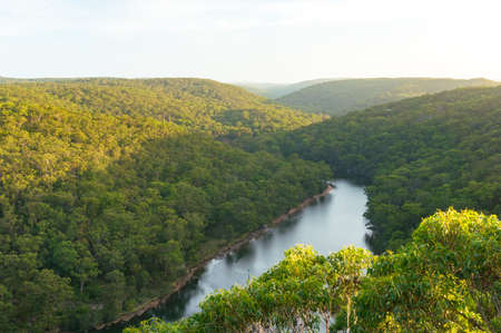 View from above on Royal National Park forest and Hacking river from Bungoona Lookoutの写真素材