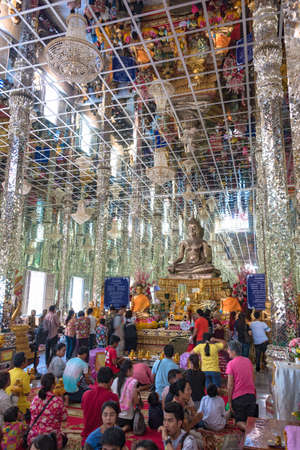 Ang Thong, Thailand - December 31, 2015: People in Silver Ubosot, Mirror temple at Wat Muangのeditorial素材