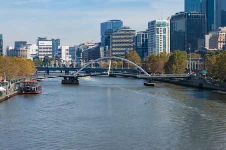 Melbourne, Australia - April 19, 2017: Beautiful Melbourne cityscape with Southbank pedestrian bridge and Yarra riverのeditorial素材