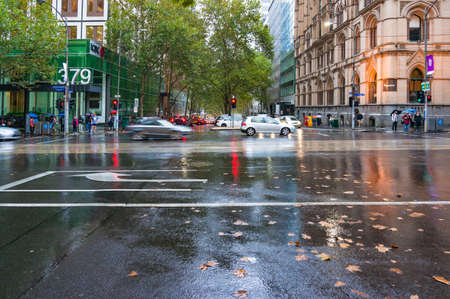 Melbourne, Australia - April 21, 2017: Intersection of Collins and Queen street on rainy dayのeditorial素材