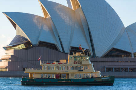 Sydney, Australia - July 23: Ferry boat in Circular Quay with Sydney Opera House on the background. Sydney public water transport infrastructureのeditorial素材