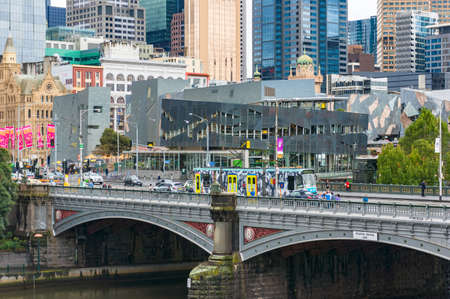 Melbourne, Australia - April 21, 2017: Princes Bridge with tramway and people. Melbourne infrastructure and historic landmarkのeditorial素材