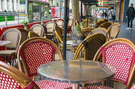 Melbourne, Australia - April 17, 2017: Outdoor cafe setting with bright chairs and pineapples on tables in Melbourne CBDのeditorial素材