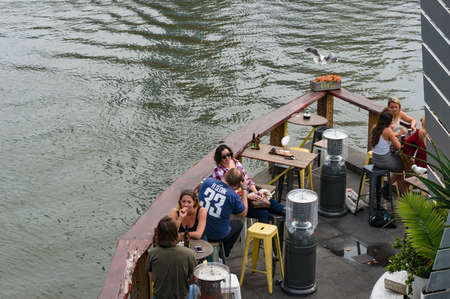 Melbourne, Australia - April 20, 2017: People relaxing and drinking in famous Pony Fish Bar