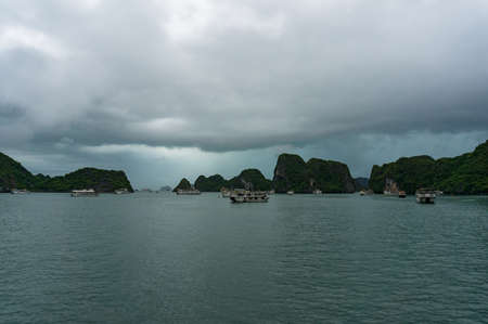 Ha Long Bay, Vietnam - August 13, 2017: Cruise boats in Halong Bay World Heritage Siteのeditorial素材