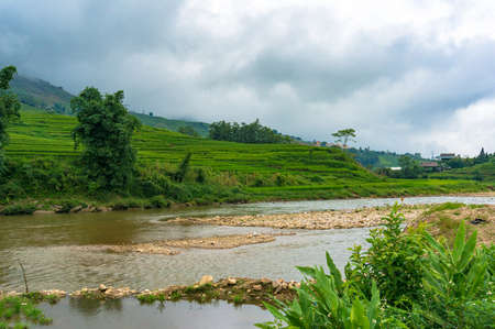River and rice terraces landscape. Rural Vietnam scene
