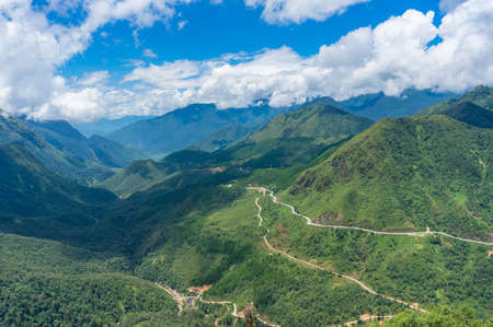 Stunning view on tropical mountain valley and winding road. Nature background. Heaven gate, Vietnamの写真素材