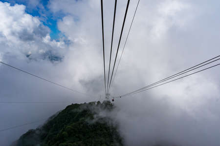 Cable car high in the mountains. Travel experience backgroundの写真素材