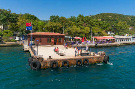 Istanbul, Turkey - August 28, 2013: Rumeli Kavagi ferry wharf with peopleの写真素材