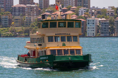 Sydney, Australia - December 02, 2008: Sydney ferry with residential buildings on the backgroundのeditorial素材