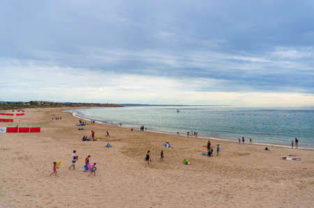 Port Noarlunga, Australia - November 11, 2017: Port Noarlunga beach with people relaxing and sunbathingのeditorial素材
