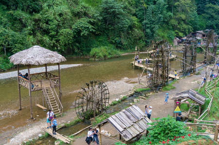 Cat Cat, Vietnam - August 20, 2017: Water mills and creek in Cat Cat tourist villageのeditorial素材