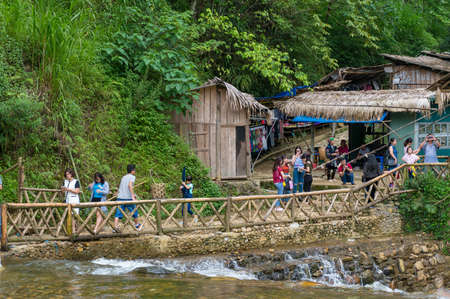 Cat Cat, Vietnam - August 20, 2017: Tourists on the bridge in Cat Cat ethnic villageのeditorial素材