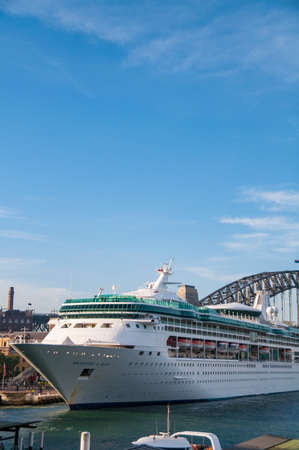 Sydney, Australia - December 2, 2008: Ocean liner, cruise liner, ship with Sydney Harbour bridge on the backgroundのeditorial素材
