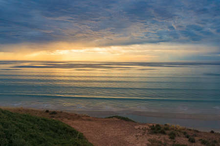 Spectacular view from the hill on sunset over sea, ocean. Nature background, seascapeの写真素材