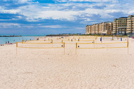 Glenelg, Australia - November 13, 2017: Beach volleyball, netball nets on Glenelg beach on sunny dayの写真素材