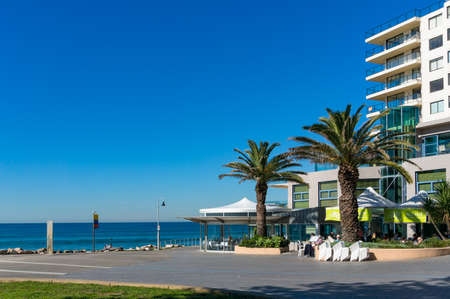 Cronulla, Australia - July 29, 2013: Cronulla beach with restaurants and cafes on sunny dayのeditorial素材