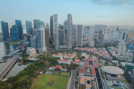 Aerial view of Singapore CBD with office buildings. Modern Asian city, urban sprawl backgroundの写真素材