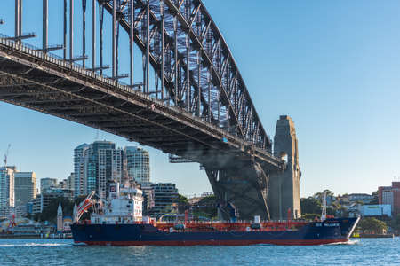 Sydney, Australia - July, 23, 2016: Oil tanker under Sydney Harbour Bridge in Sydney Harbour