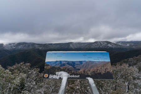 Snowy Mountains, Australia - July 21, 2013: Snowy Mountain lookout in winter with forest covered in snowのeditorial素材