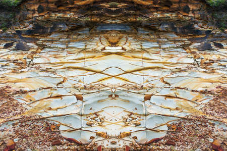 White rock with orange rusty cracks nature texture, symmetrycal background