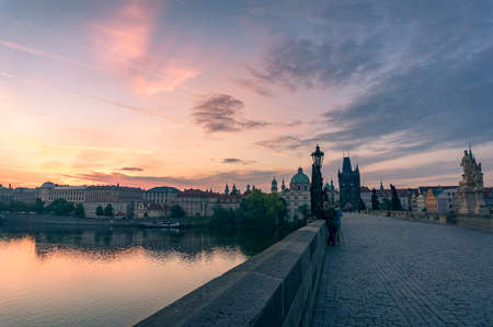Beautiful sunrise panorama with historic Charles Bridge in Prague, Czech Republicの写真素材