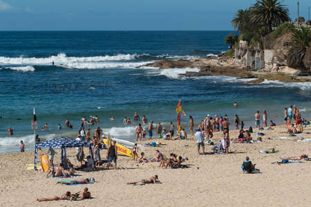 Sydney, Australia - April 21, 2019: People having fun at sandy beach on sunny day. Coastal lifestyle sceneのeditorial素材
