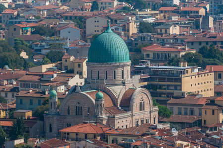 Aerial view of Synagogue and museum building with green dome in Florence, Italyの写真素材