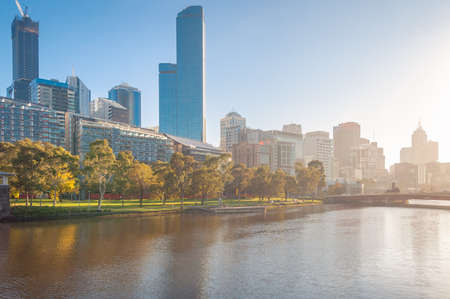 Melbourne cityscape with sunset sunshine at autumn. Australiaの写真素材