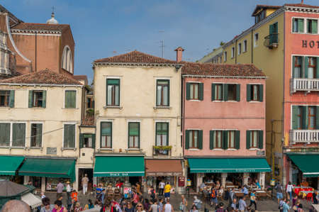 Venice, Italy- September 27, 2013: Venetian street with shops and crowds of touristsのeditorial素材