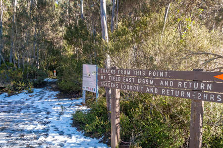 Tasmania, Australia - July 20, 2014: Direction sign with information for hikers with tracks to Central Highlands park destinations. Trekking navigation tourism infrastructureのeditorial素材