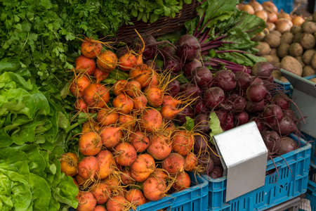 Beets and greens close up background fresh produce texture. Fresh organic produce background 