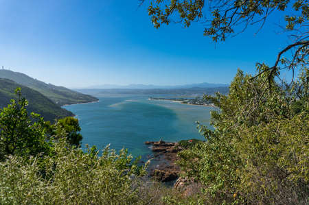 Picturesque view of beautiful lagoon and mountains on sunny day. Knysna, South Africaの写真素材