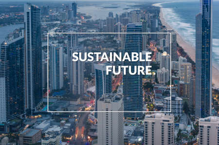 Sustainable future banner, poster design with modern cityscape. Aerial urban skyline with beach brochure cover design with text saying Sustainable Futureの写真素材